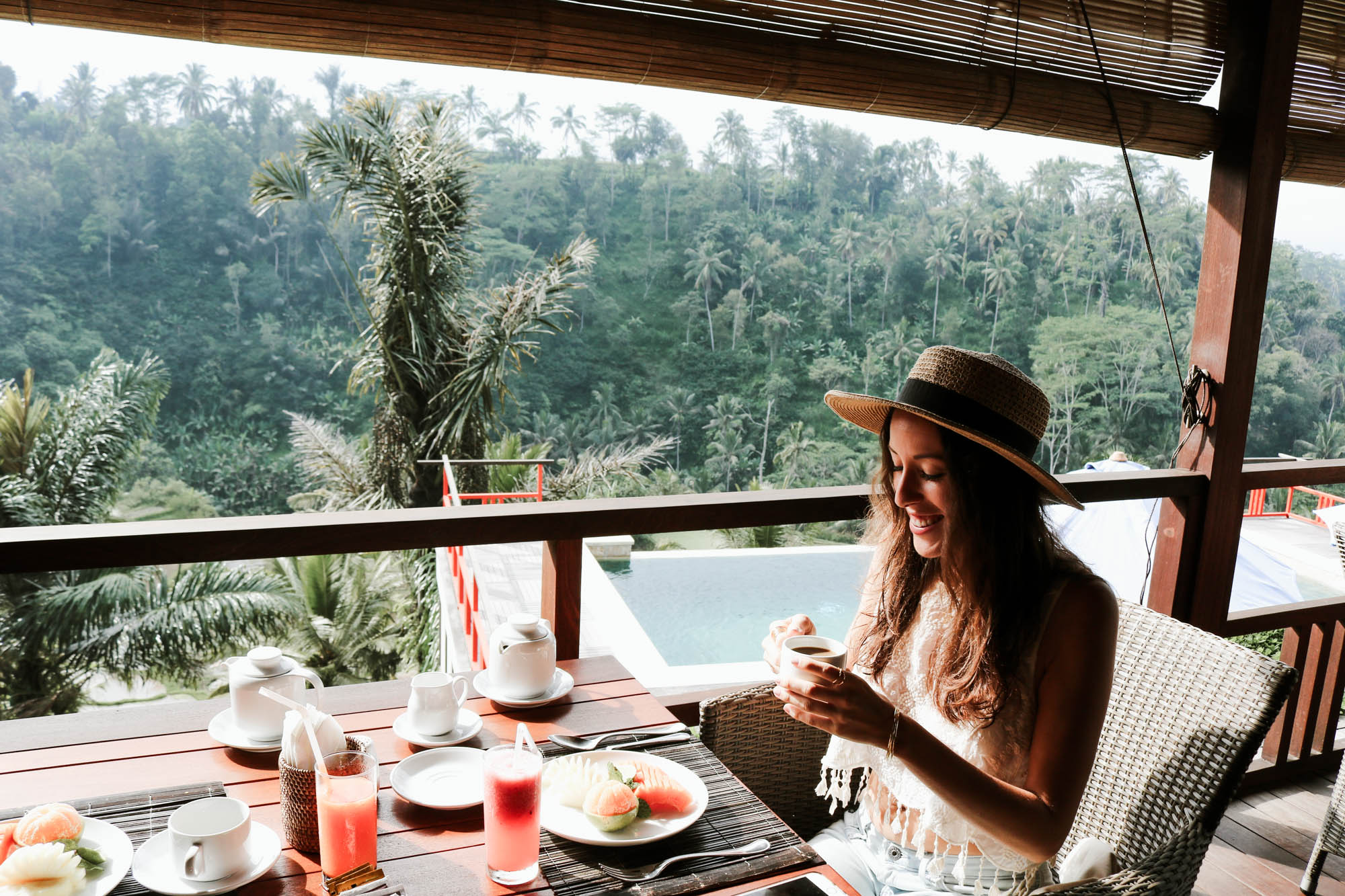 Nestled in the cliffside of a small rural village about 30 minutes north of Ubud, Bali is this magical, jungle oasis: Suarapura Resort. Click to see our full review and must-see Bali adventures! 